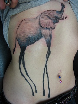 Dali Elephant Tattoo On Girl Front Body