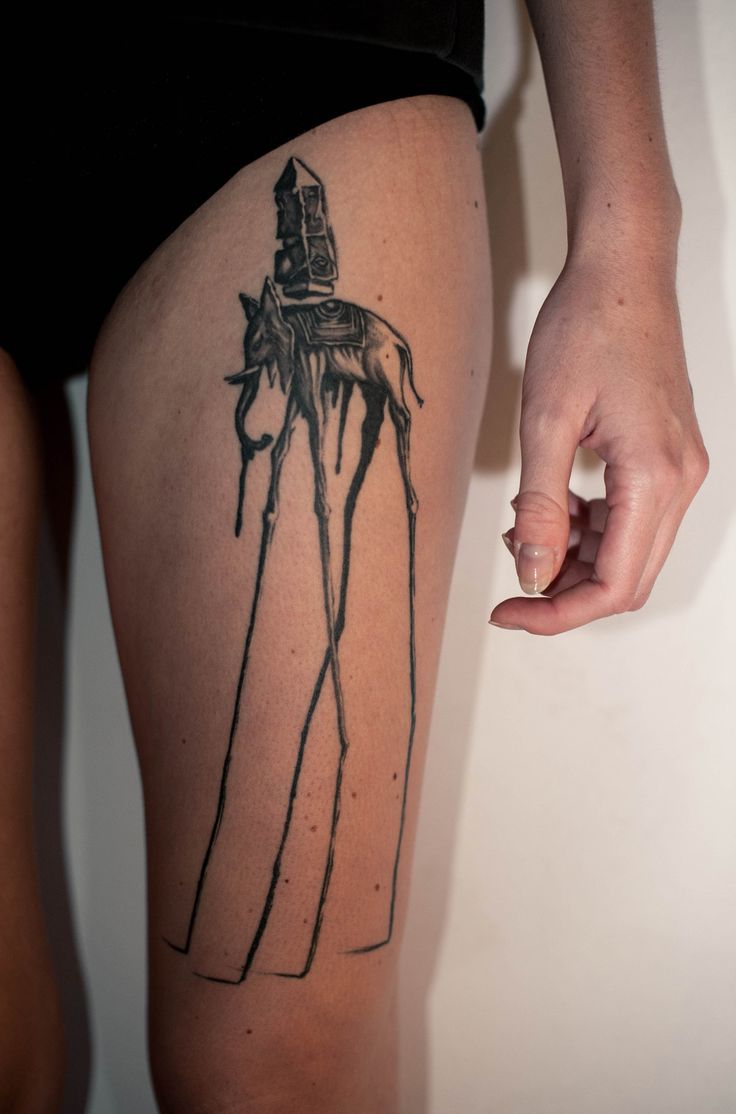 Dali Elephant Tattoo On Left Thigh