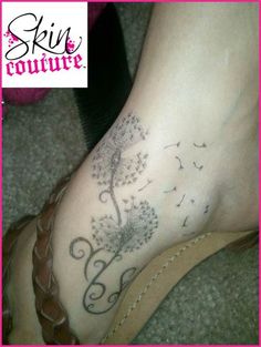 Dandelion Blowing From Puff In Beautiful Size Tattoo On Foot