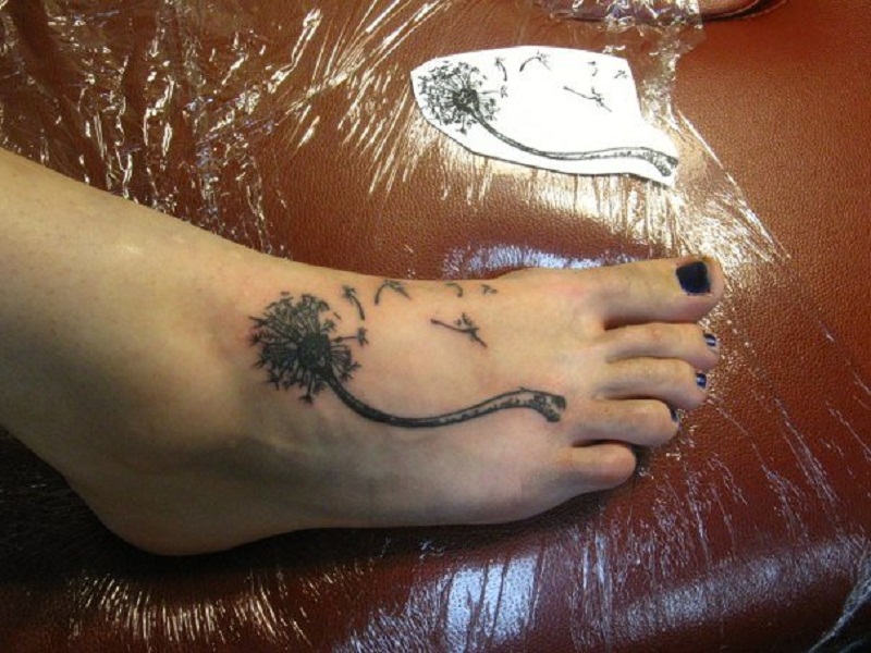 Dandelion Blowing From Puff In Cute Shape Tattoo On Foot