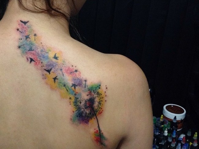 Dandelion Blowing From Puff In Different Watercolors Tattoo On Right Shoulder to Back Neck