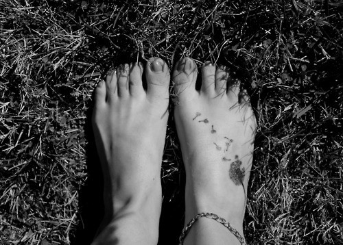 Dandelion Blowing From Puff In Light Black Ink Tattoo On Foot