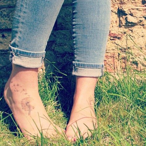 Dandelion Blowing From Puff In Light Brown Ink Tattoo On Both Foots