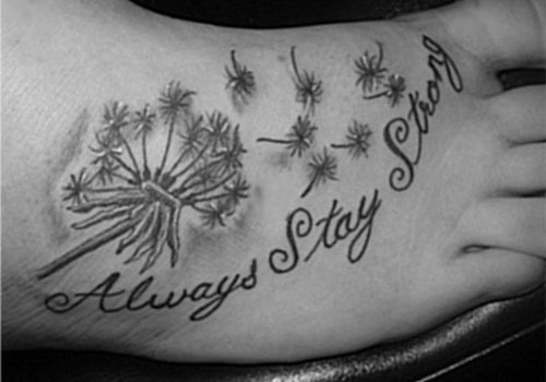 Dandelion Blowing From Puff With Always Stay Strong Tattoo On Foot
