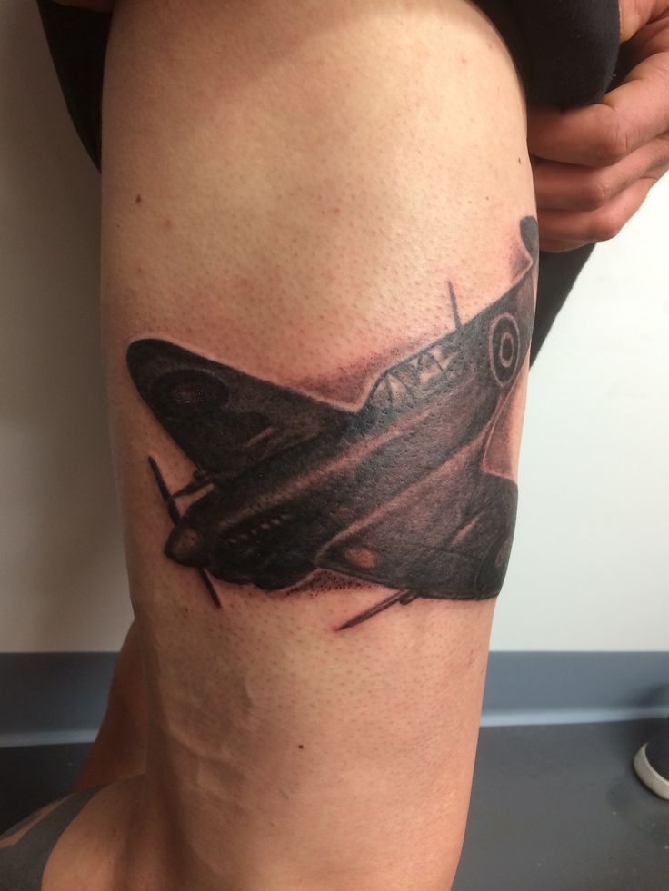 Dark Ink Spitfire Tattoo On Side Leg