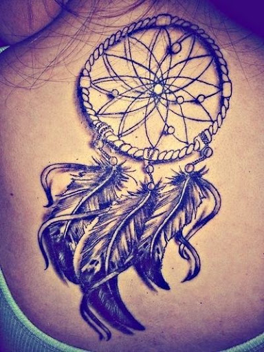 Dream Catcher Tattoo In Black And Grey Ink On Upper Back For Women