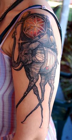 Geometric Dali Elephant Tattoo On Girl Left Shoulder