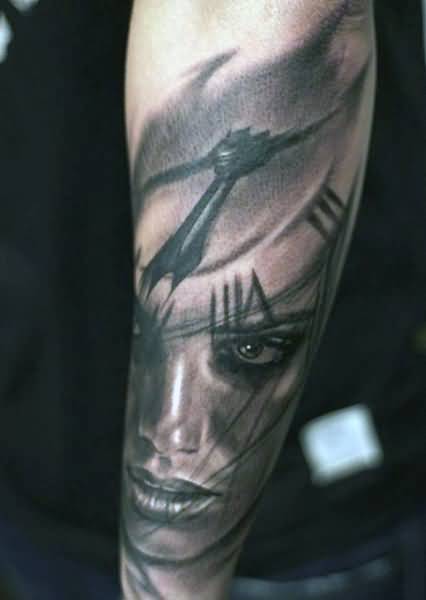Girl Face In Clock Tattoo On Left Sleeve