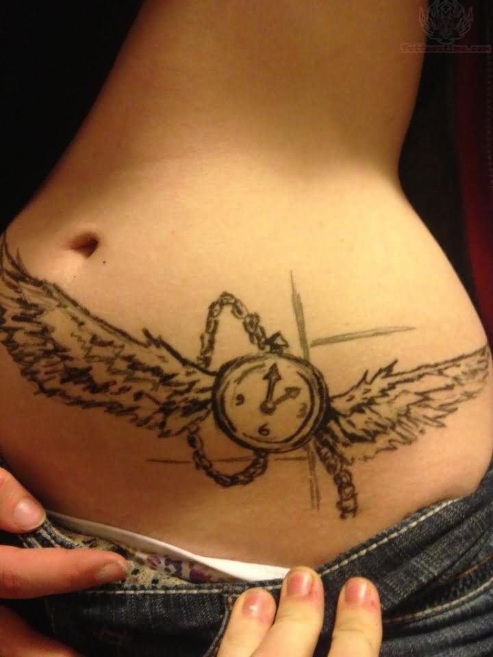 Girl Showing Her Clock Tattoo on Left Hip