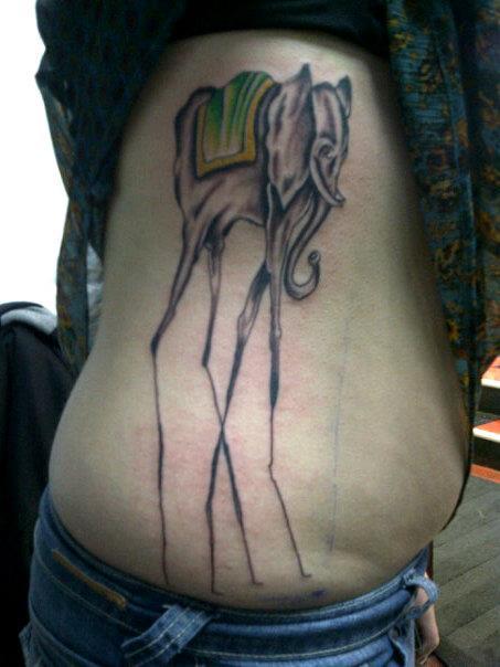 Girl Side Rib Dali Elephant Tattoo