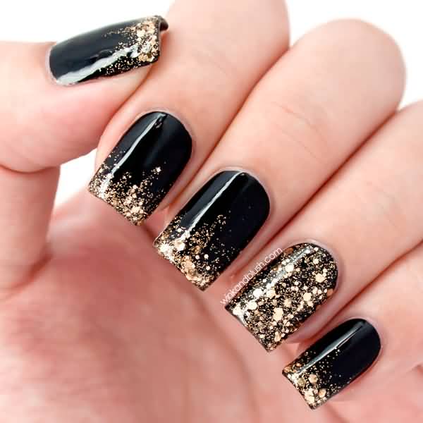 Glossy Black And Golden Glitter Ombre Nail Art