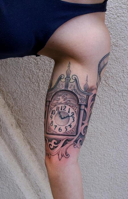Grandfather Clock Tattoo On Inner Bicep by Jeff Norton