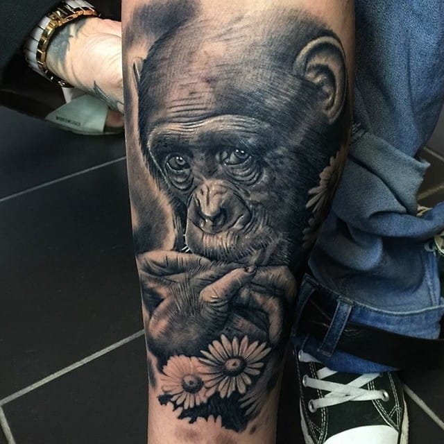 Grey Flower And Chimpanzee Tattoo On Arm Sleeve by Kelvin Slack