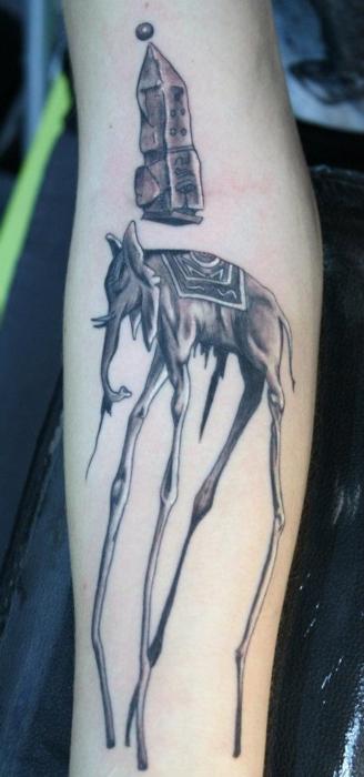 Grey Ink Dali Elephant Tattoo On Girl Forearm
