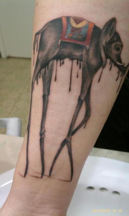 Grey Ink Forearm Dali Elephant Tattoo