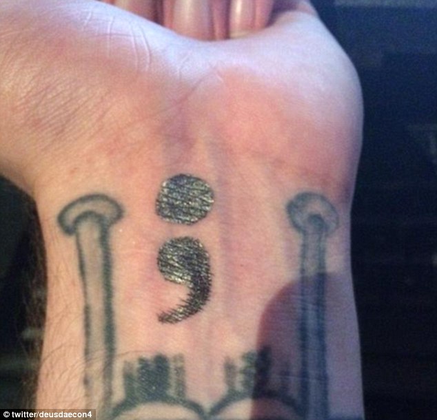 Grey Ink Semicolon Tattoo On Left Wrist For Girls
