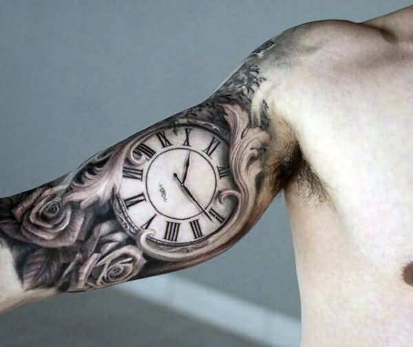 Grey Rose Flowers And Clock Tattoo On Bicep