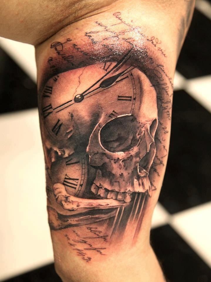 Grey Skull And Clock Tattoo On Inner Bicep