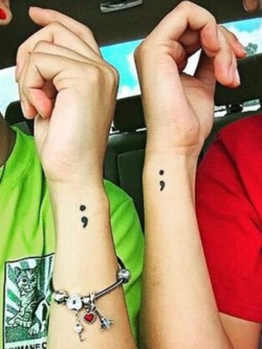 Matching Semicolon Tattoos on Wrists