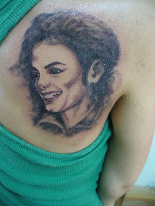 Michael Jackson Tattoo On Right Back Shoulder
