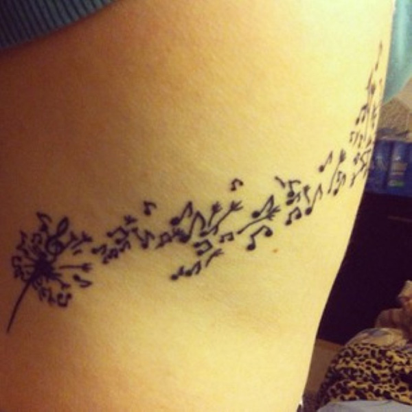 Music Notes Blowing From Dandelions Tattoo On Shoulder