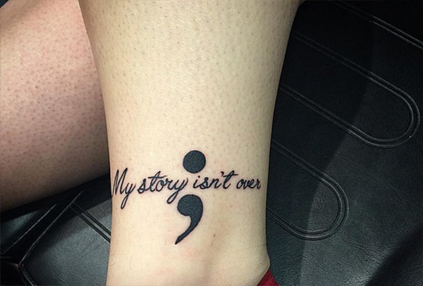 My Story Isn't Over Semicolon Tattoo On Leg