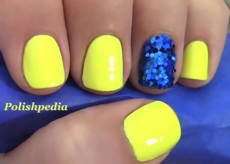 Neon Yellow Nails With Blue Glitter Accent Nail Art