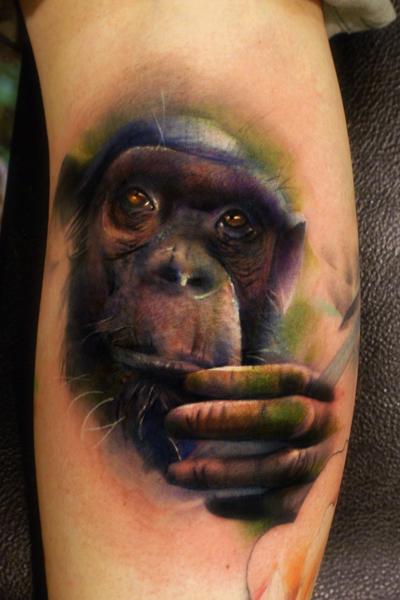 Nice Chimpanzee Tattoo On Back Leg