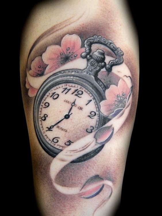 Nice Flowers And Clock Tattoo