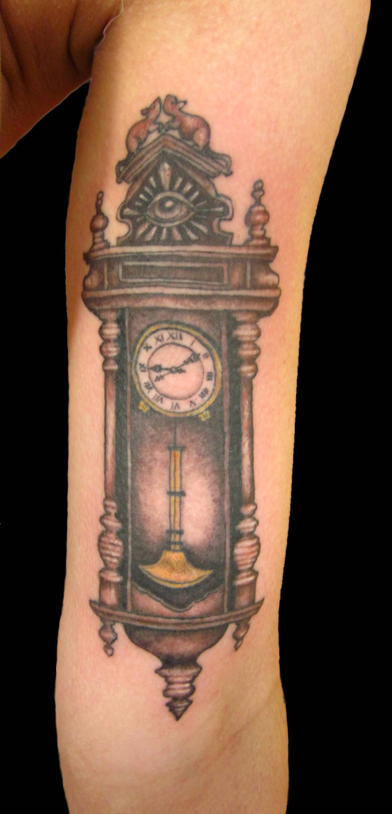 Nice Grey Ink Grandfather Clock Tattoo On Inner Bicep