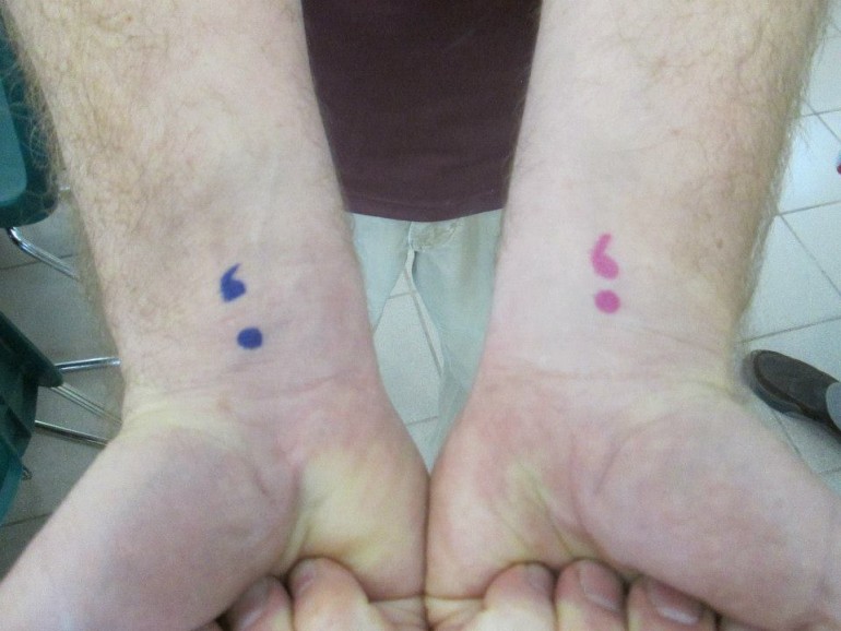 Pink And Blue Semicolon Tattoos On Wrists