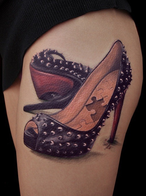 Puzzle Piece Shoes Tattoo On Girl Thigh