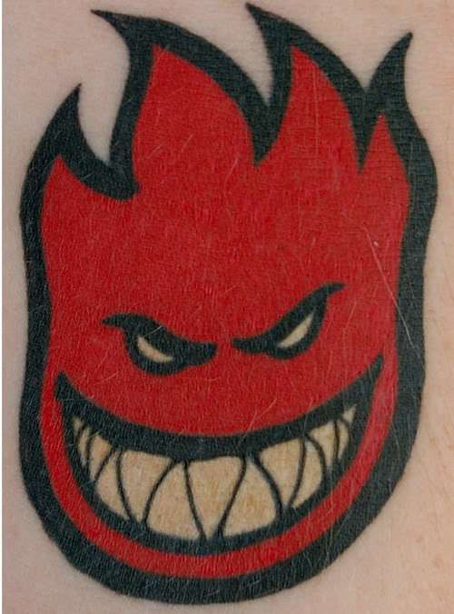 Red Ink Spitfire Logo Tattoo