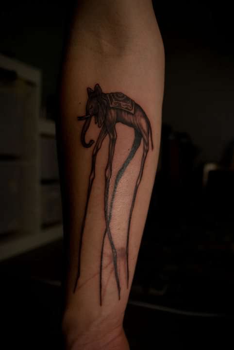 Salvador Dali Elephant Tattoo On Left Sleeve