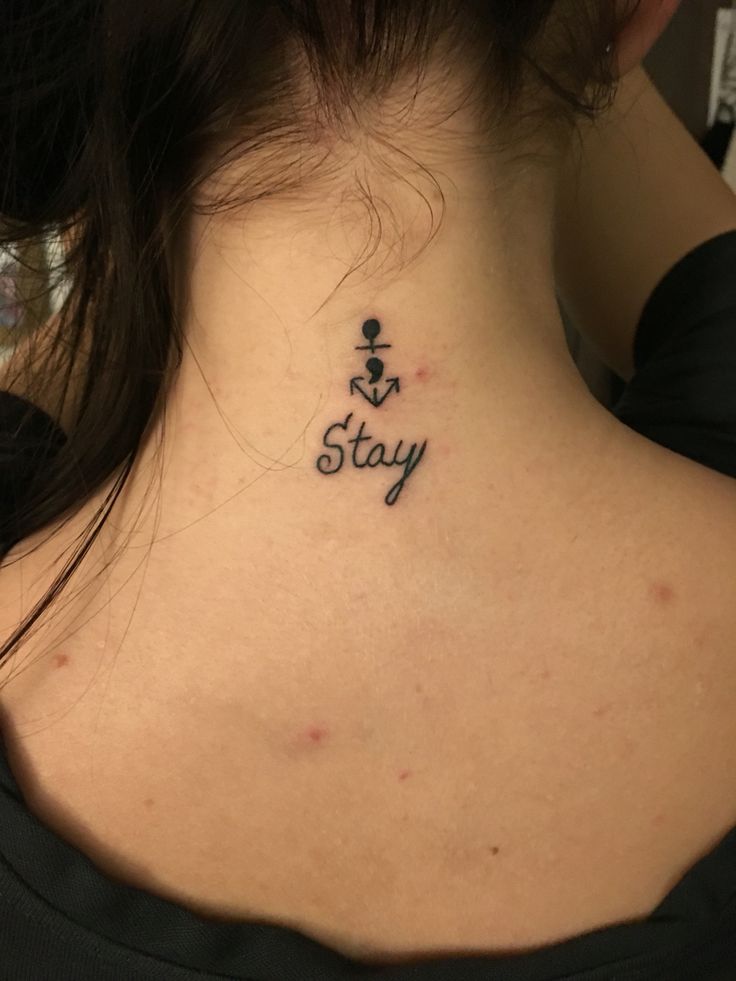 Semicolon Anchor Tattoo On Girl Nape