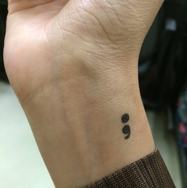 Semicolon Tattoo Design On Girl Right Wrist