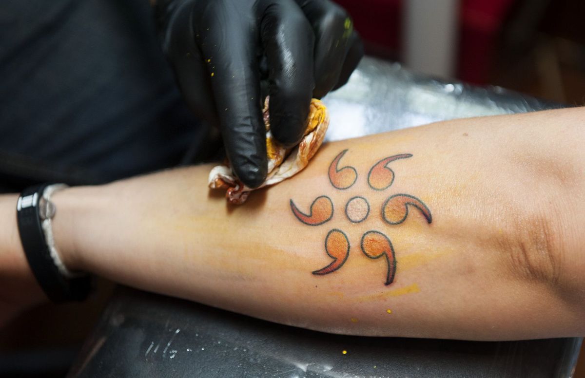 Semicolon Tattoos On Left Arm