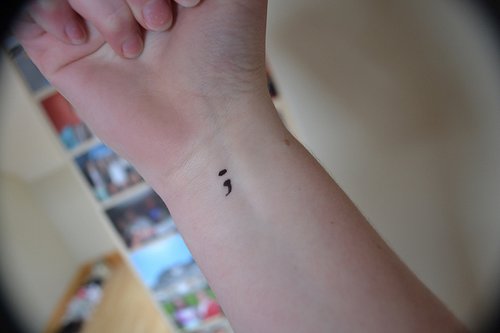 Small Semicolon Tattoo On Right Wrist
