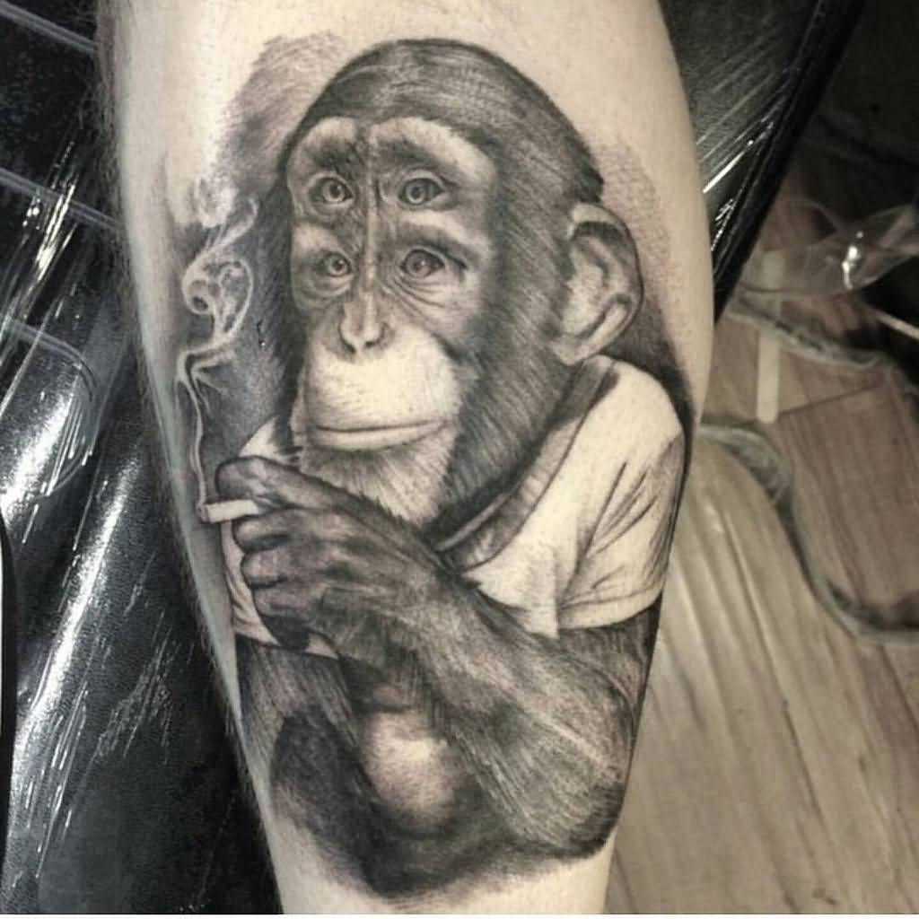 Smoking Chimpanzee With Four Eyes Tattoo On Thigh