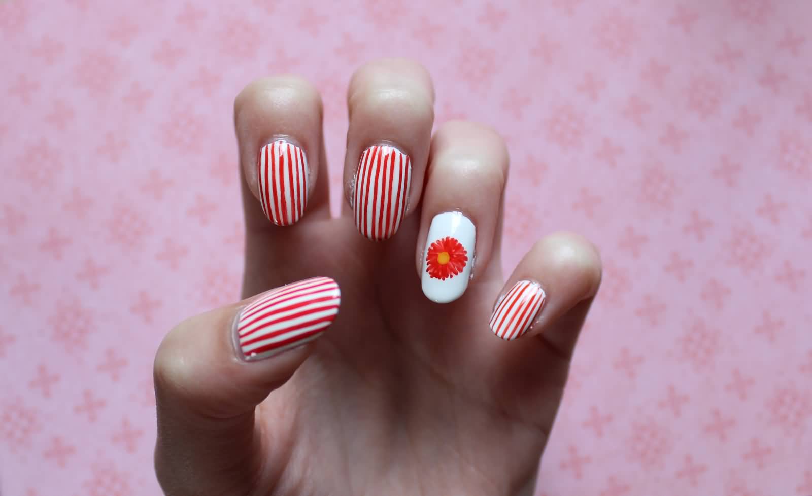 Stripes Nails With Orange Flower Accent Nail Art