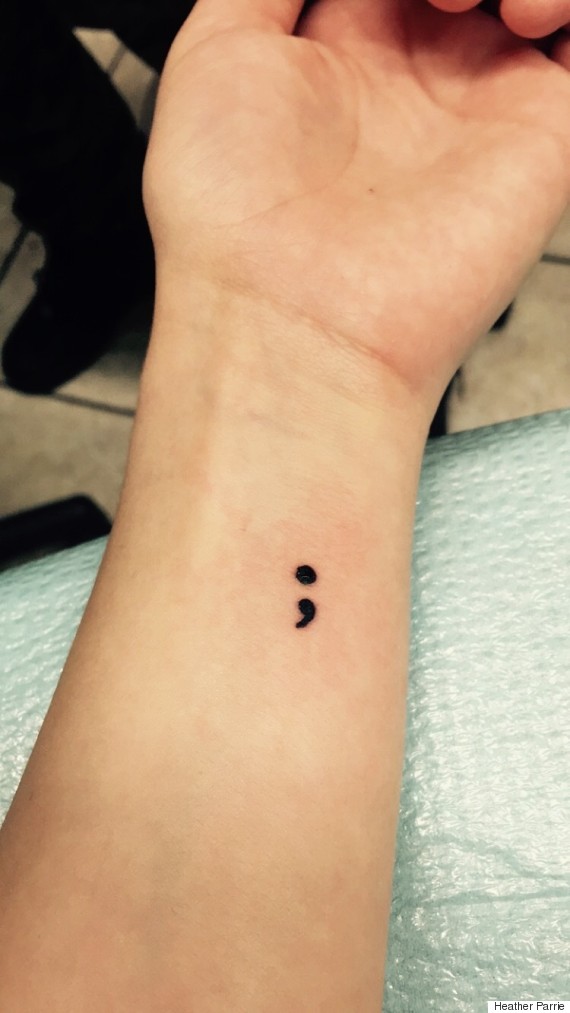 Tiny Semicolon Tattoo On Left Forearm