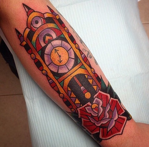 Traditional Rose And Grandfather Clock On Arm
