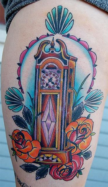 Traditional Rose Flowers And Grandfather Clock Tattoo On Leg