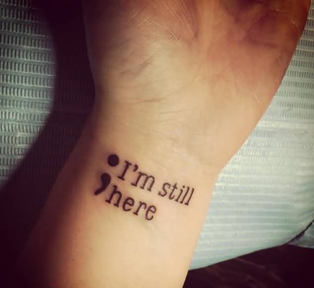 U'm Still Here Semicolon Tattoo On Left Wrist