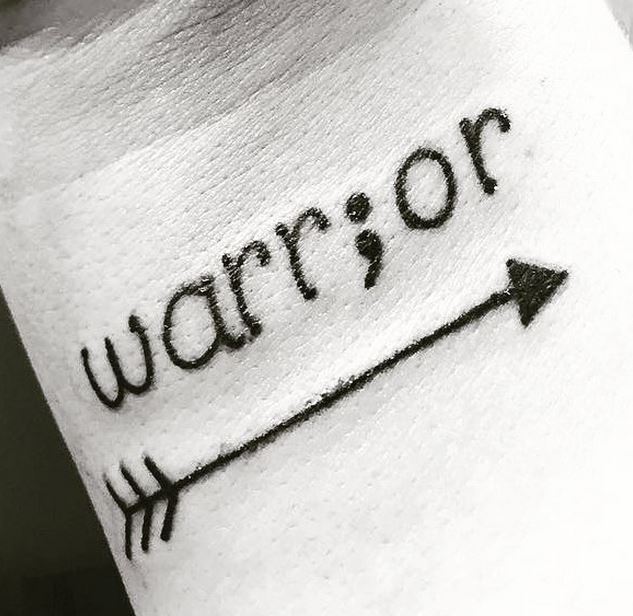 Warrior Word With Semicolon Tattoo On Wrist