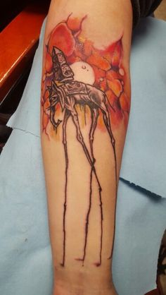 Watercolor Flowers And Dali Elephant Tattoo On Forearm