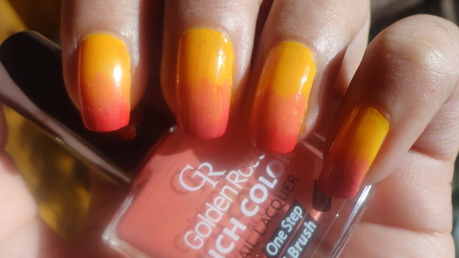 Yellow And Orange Ombre Nail Art