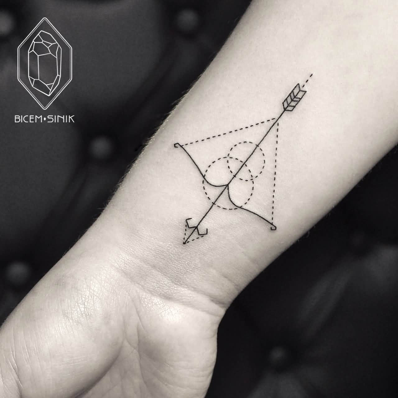 Absolutely Incredible Bow And Arrow Tattoo On Wrist