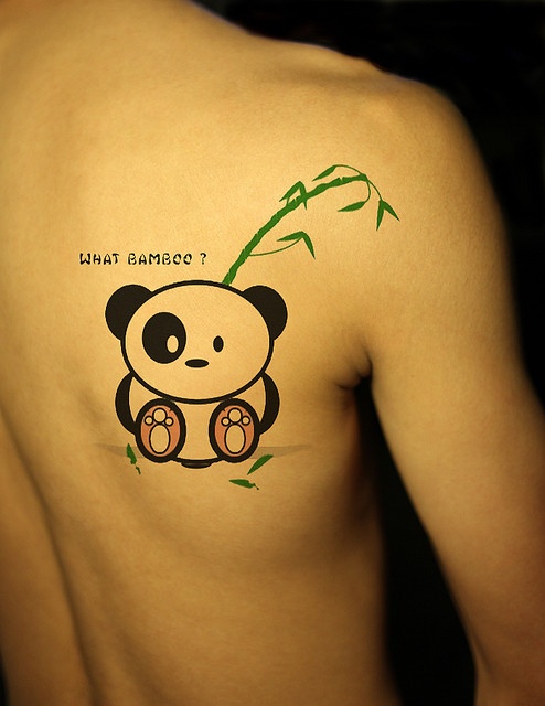 Adorable Baby Panda Hiding Bamboo Tattoo On Right Side Of Back