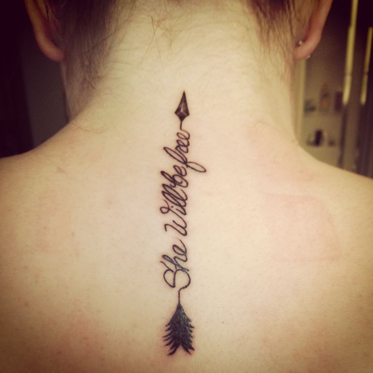 Amazing Arrow With Wording She Will Be Free Tattoo On Nape